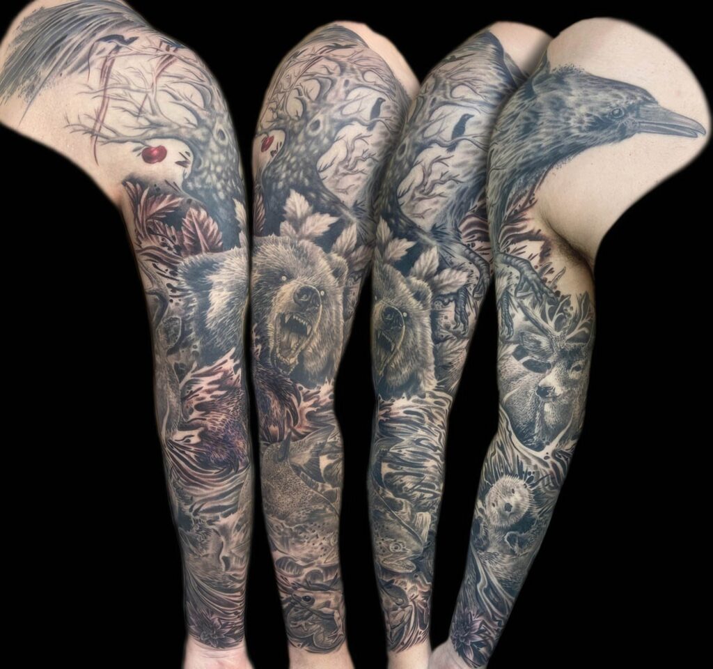 Four arms with full sleeve tattoos displaying various detailed animal and nature-themed designs, including a bear, raven, deer, and forest elements against a black background.