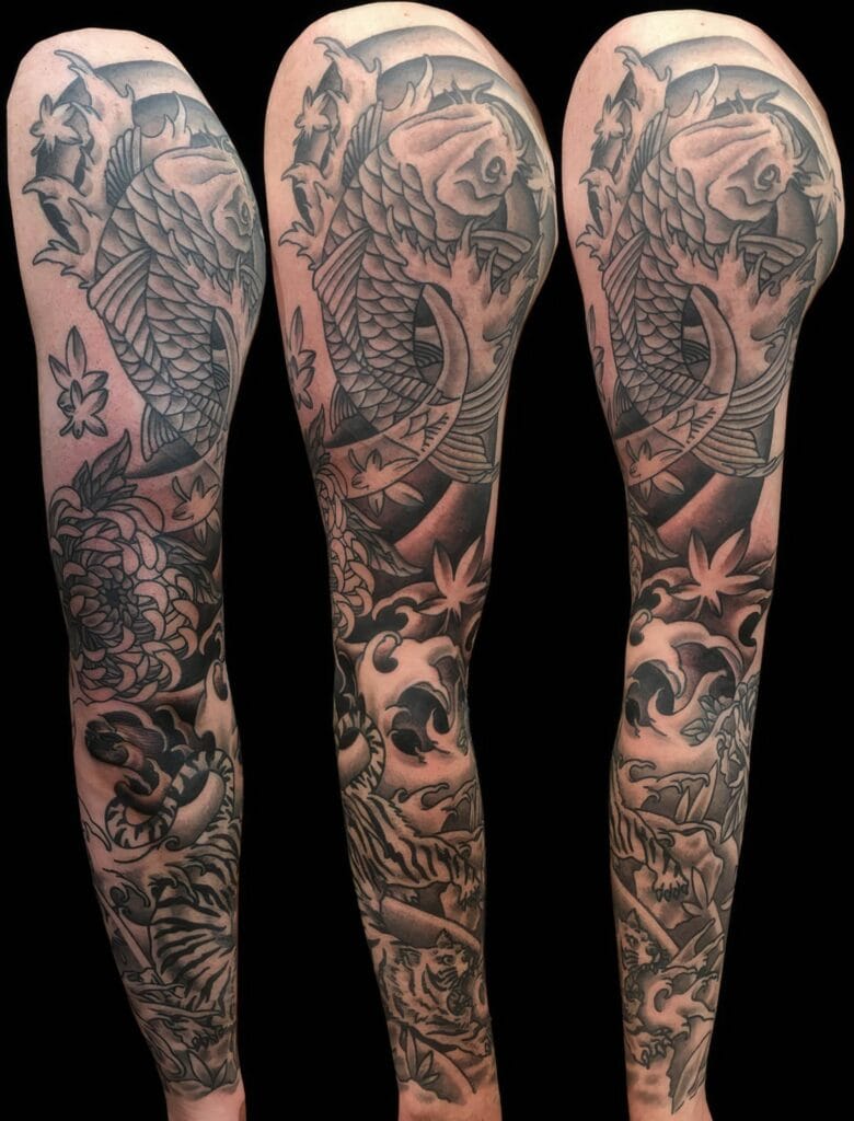 Three views of a heavily tattooed arm featuring a large koi fish surrounded by detailed floral and aquatic elements. The tattoos are in black and gray ink.